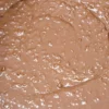 Crema al cioccolato al latte e cocco con fiocchi di cocco