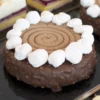 Crema per praline composta da zucchero caramellizzato e nocciole tostate per il 50%